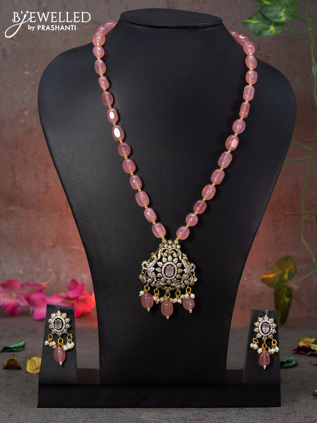 Beaded pink necklace peacock design with baby pink & cz stones and beads hanging in victorian finish