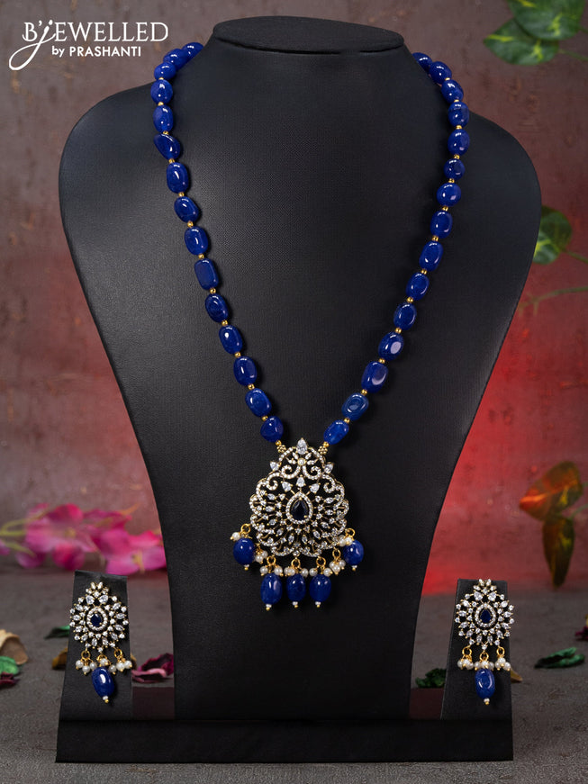 Beaded blue necklace with sapphire & cz stones and beads hanging in victorian finish