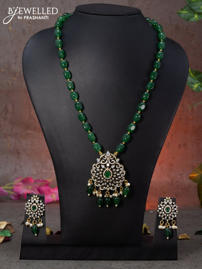 Beaded green necklace with emerald & cz stones and beads hanging in victorian finish