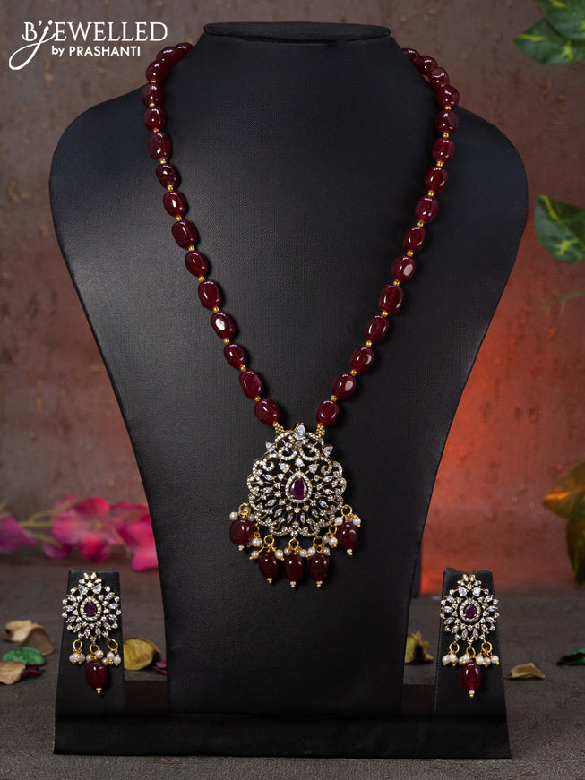 Beaded maroon necklace with ruby & cz stones and beads hanging in victorian finish