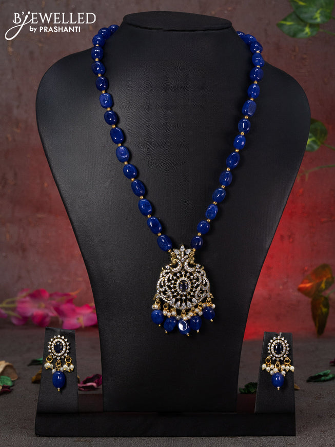 Beaded blue necklace peacock design with sapphire & cz stones and beads hanging in victorian finish