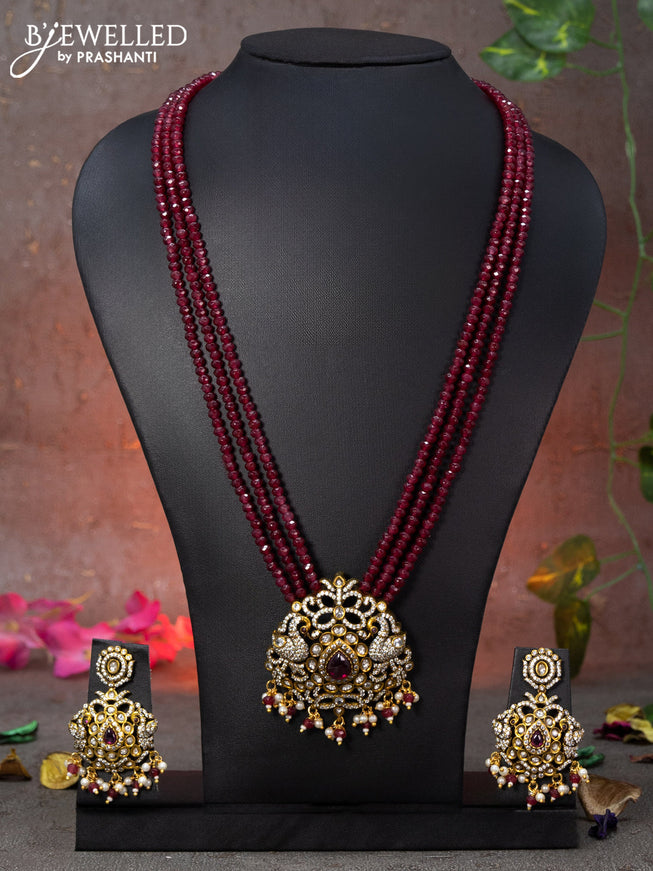 Beaded triple layer maroon necklace peacock design with pink kemp & cz stones and beads hanging in victorian finish