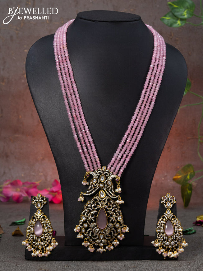 Beaded multi layer baby pink necklace peacock design with cz stones and beads hanging in victorian finish
