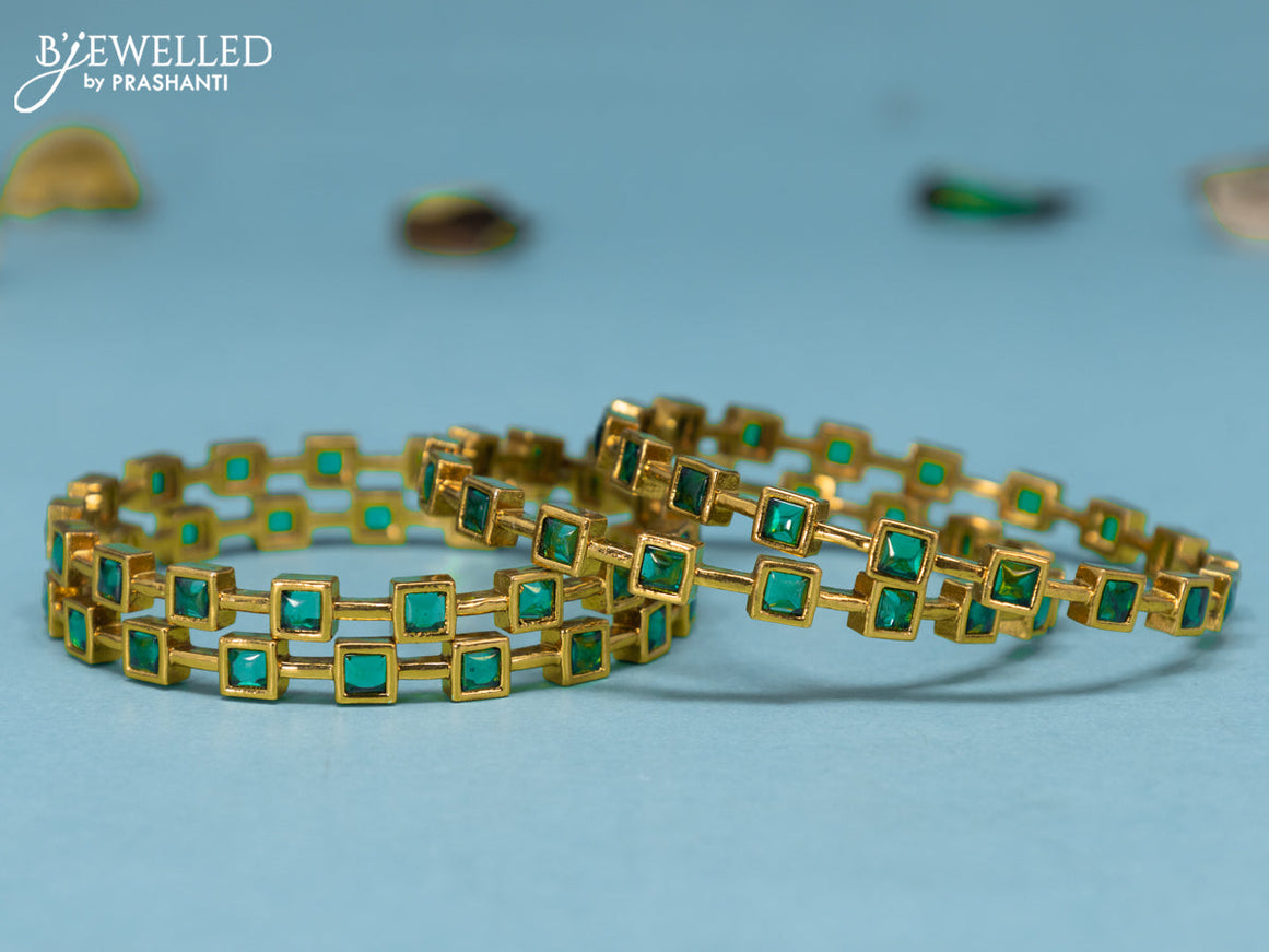 Antique bangles with emerald stones