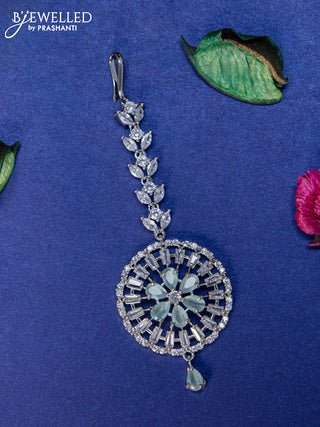 Zircon maang tikka floral design with mint green & cz stones and hangings