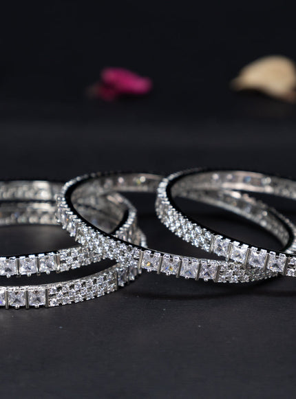 Zircon bangles with cz stones