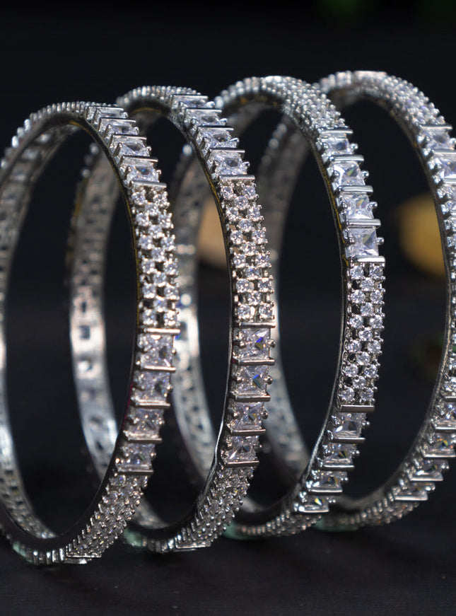 Zircon bangles with cz stones