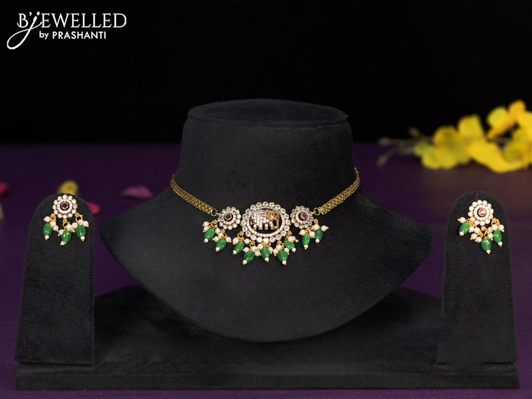 Choker elephant design with ruby & cz stones and green beads hangings in victorian finish