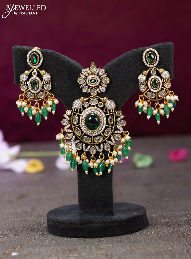 Victorian finish pendant set with emerald & cz stones and beads hanging