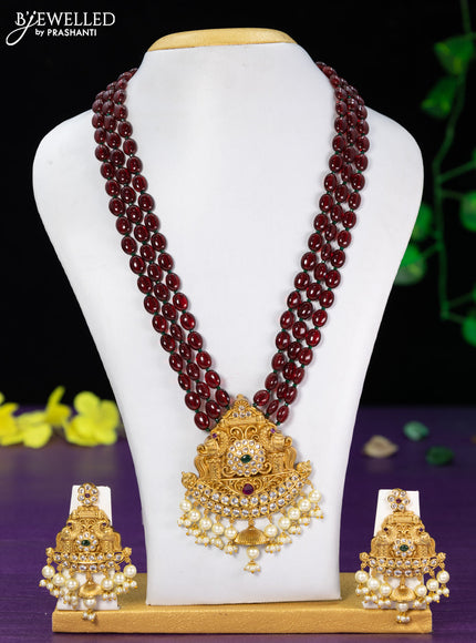 Beaded maroon necklace with kemp & cz stones and pearl hangings