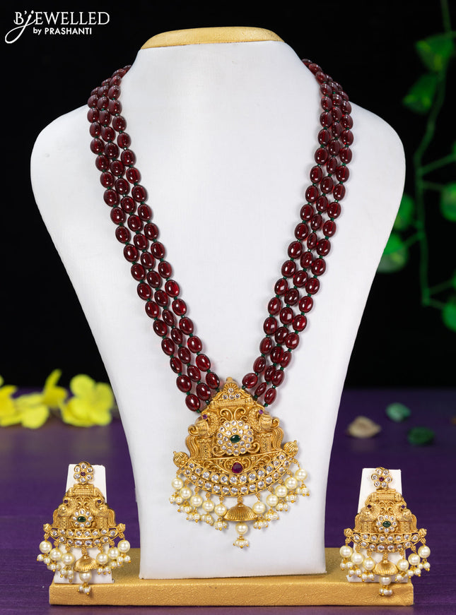 Beaded maroon necklace with kemp & cz stones and pearl hangings