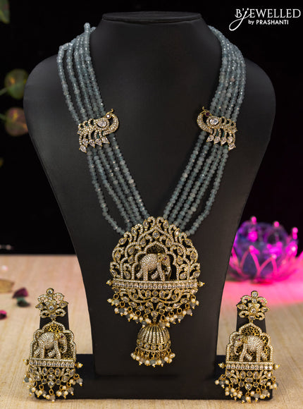 Beaded light blue necklace cz stones with elephant pendant and beads hangings in victorian finish