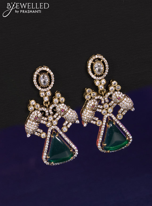 Necklace elephant design with emerald and cz stones in victorian finish