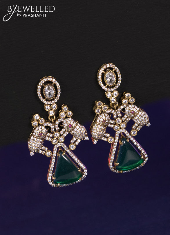 Necklace elephant design with emerald and cz stones in victorian finish