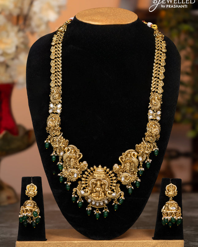 Antique haaram lakshmi design with kundan & cz stones and green beads hangings