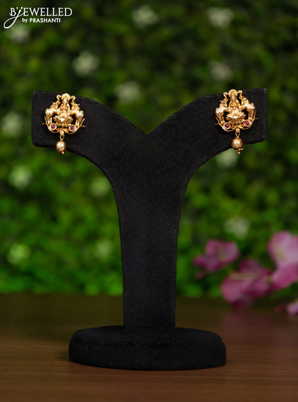 Antique pendant set lakshmi design with pink kemp stones and golden beads hanging