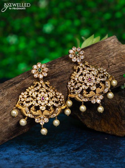 Antique earring with kemp & kundan stones and pearl hangings