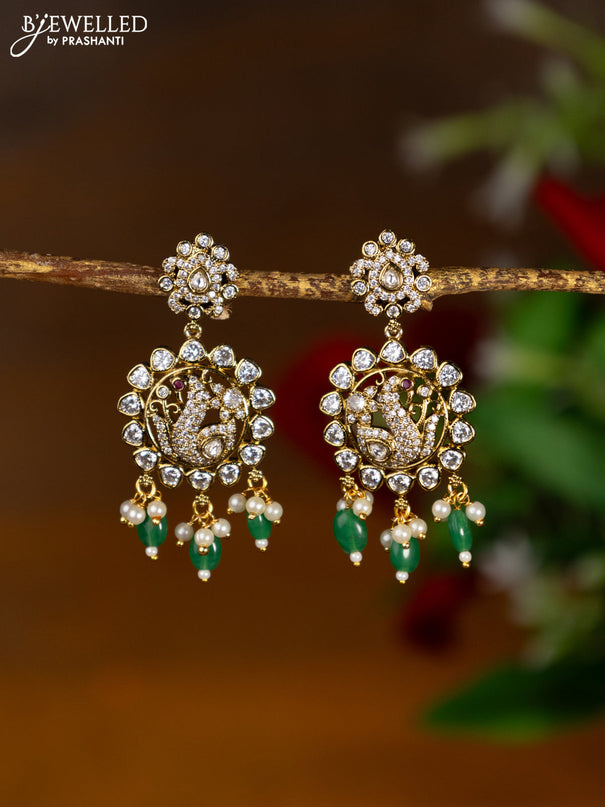 Victorian finish earrings peacock design with cz & kundan stones and green beads hanging