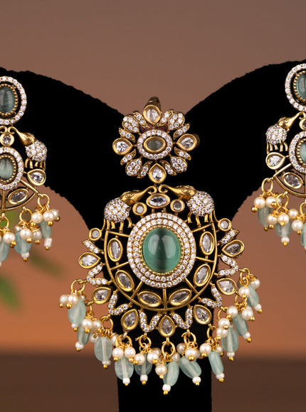 Victorian finish pendant set elephant design with mint green & cz stones and beads hanging