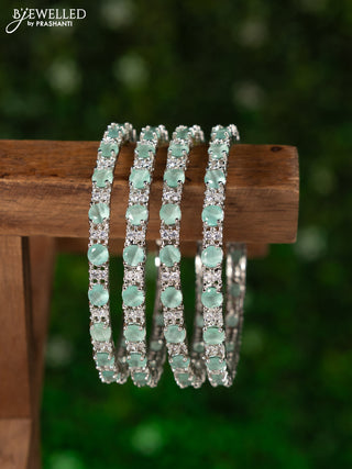 Zircon bangles with mint green and cz stones
