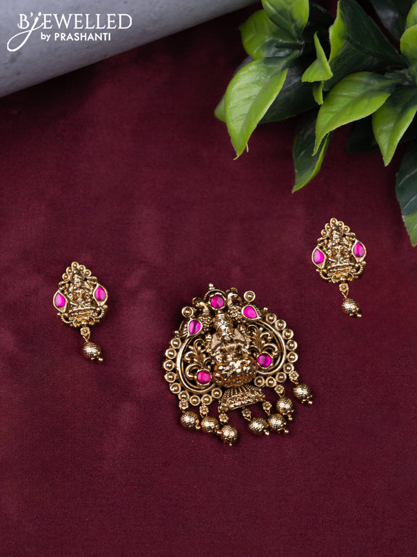 Antique pendant set lakshmi design with ruby stones and golden beads hanging