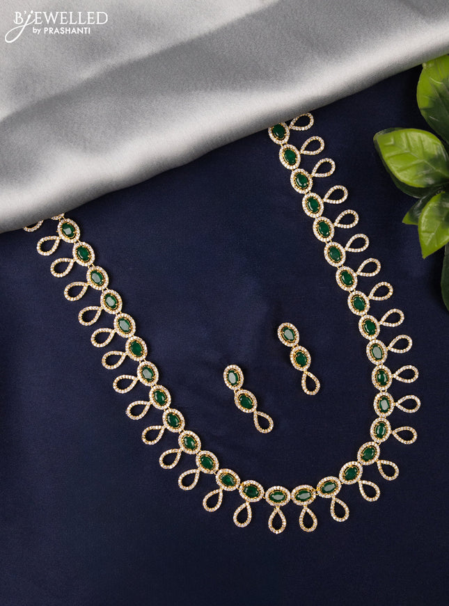 Zircon haaram with emerald and cz stones in gold finish