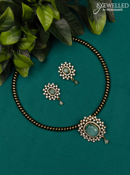 Antique ring type choker with mint green and cz stones pendant