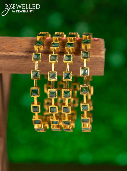Antique bangles with green kemp stones