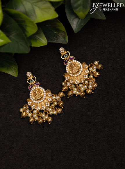 Antique earrings lakshmi design with kemp & cz stones and golden beads hanging