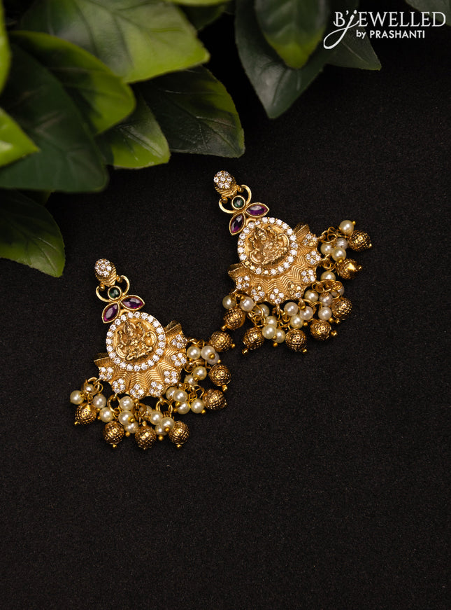 Antique earrings lakshmi design with kemp & cz stones and golden beads hanging