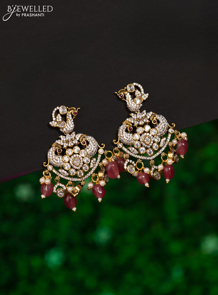 Earrings peacock design with ruby & cz stones and beads hanging in victorian finish