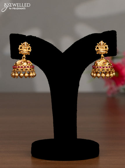 Antique haaram lakshmi design with pink kemp stones and golden beads hanging