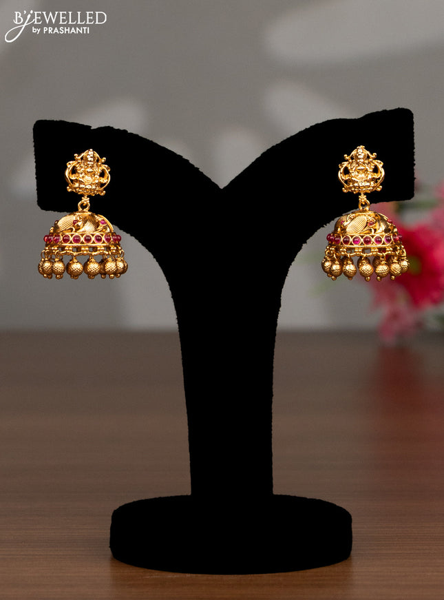Antique haaram lakshmi design with pink kemp stones and golden beads hanging