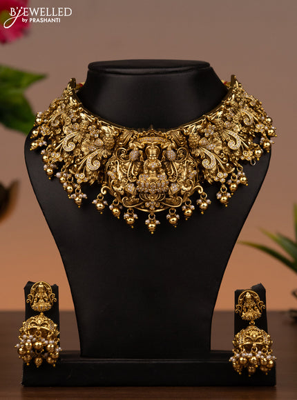 Antique necklace lakshmi design with cz stones and golden beads hanging