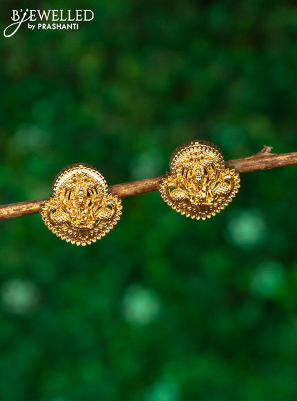 Antique earrings with ganesha design