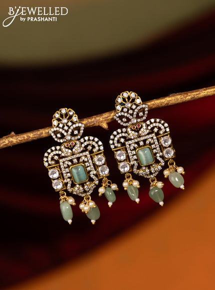 Victorian finish earrings with mint green & cz stones and beads hanging