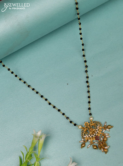 Mangalsutra lakshmi design with kemp & cz stones and golden beads hanging without earrings