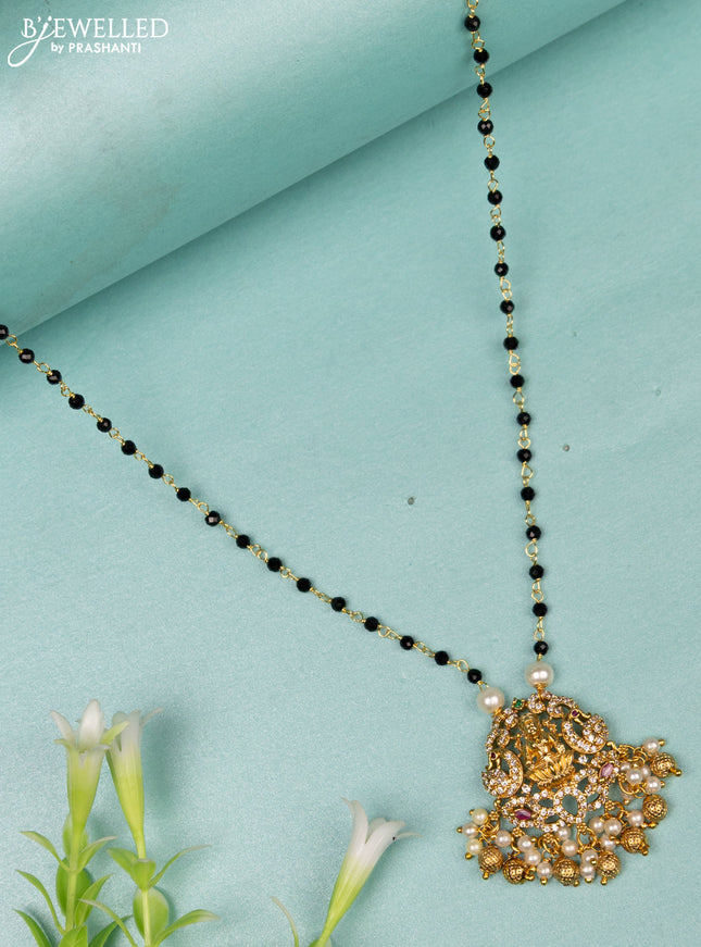 Mangalsutra lakshmi design with ruby & cz stones and golden beads hanging without earrings