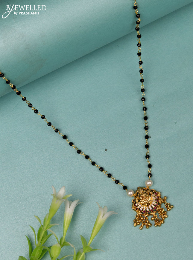 Mangalsutra lakshmi design with ruby & cz stones and golden beads hanging without earrings