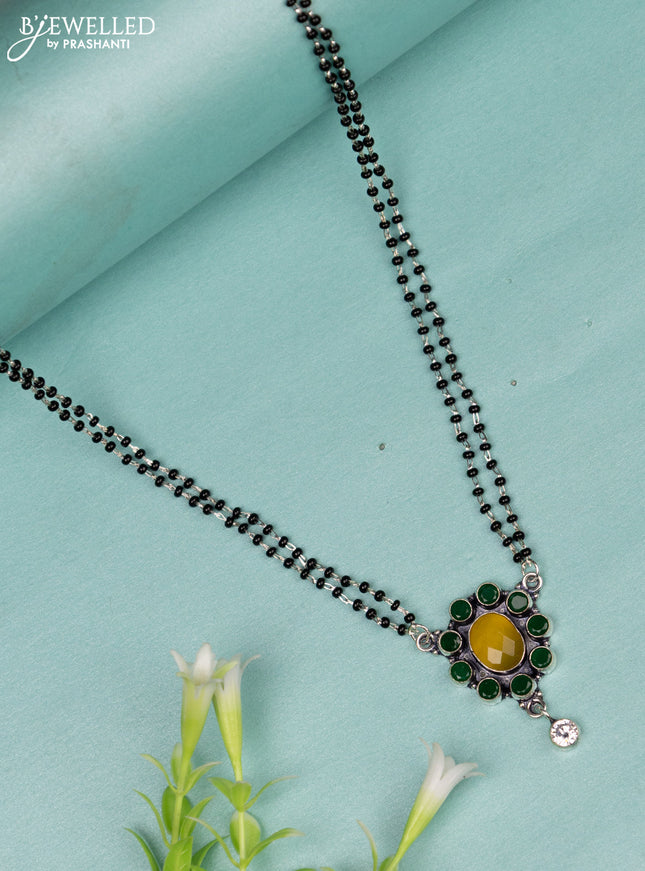 Mangalsutra double layer with emerald & yellow and cz stones without earrings