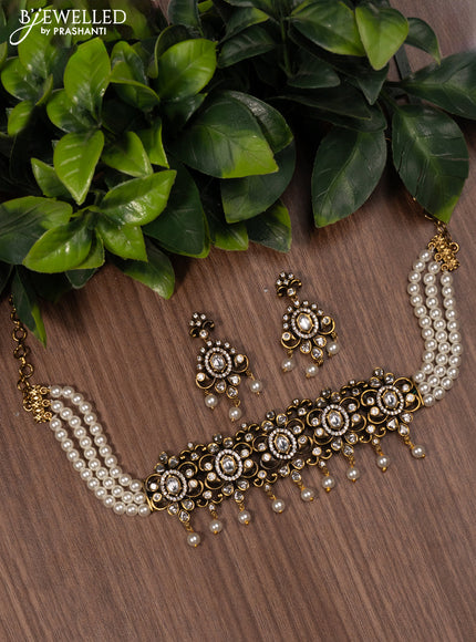 Pearl choker with kundan & cz stones and pearl hangings
