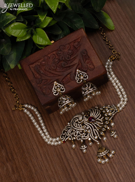 Pearl choker peacock design with ruby & cz stones and pearl hangings