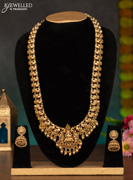 Antique haaram lakshmi & peacock design with pink kemp stones and golden beads hanging