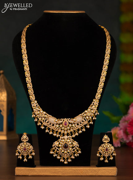 Antique haaram elephant design with pink kemp & cz stones and pearl hangings