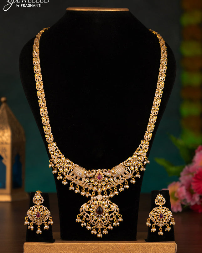 Antique haaram elephant design with pink kemp & cz stones and pearl hangings