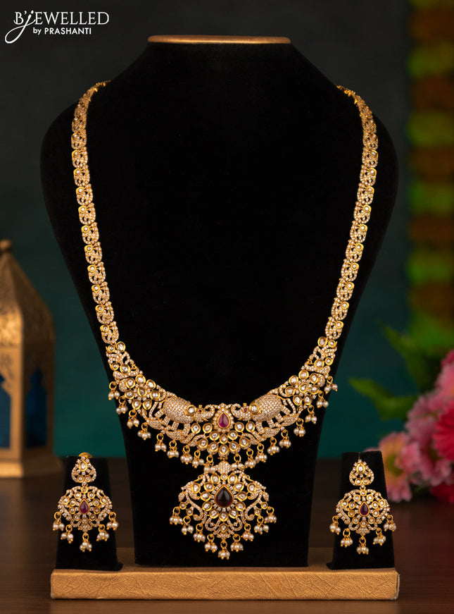 Antique haaram elephant design with pink kemp & cz stones and pearl hangings