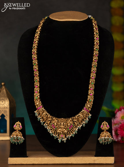 Antique haaram lakshmi design with kemp stones and mint green beads hanging
