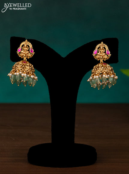 Antique haaram lakshmi design with kemp stones and mint green beads hanging