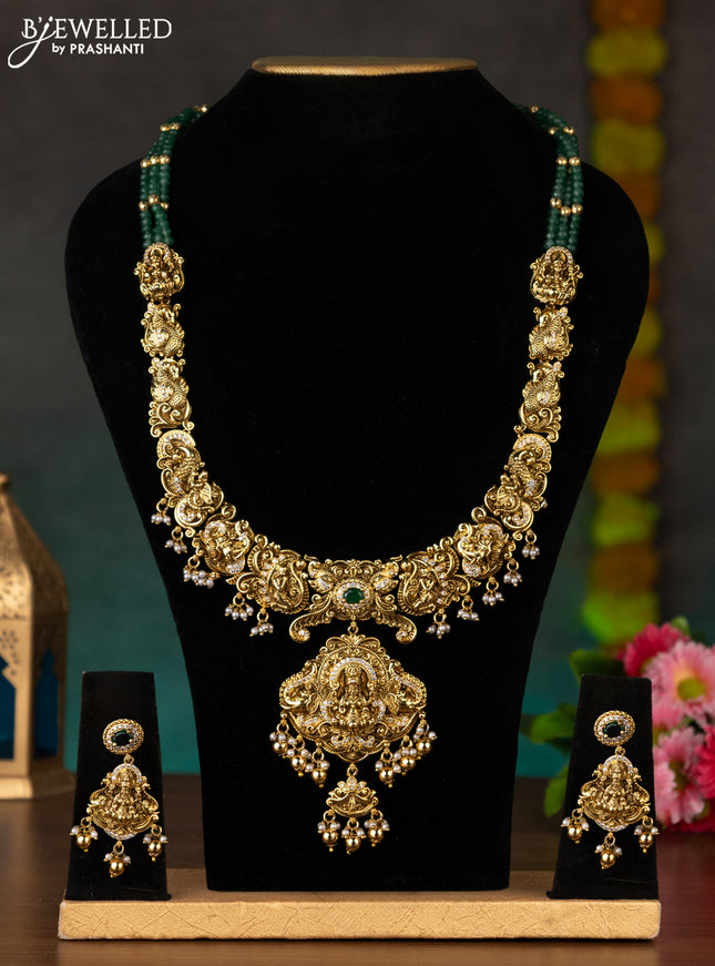 Antique haaram lakshmi design with green kemp & cz stones and golden beads hanging