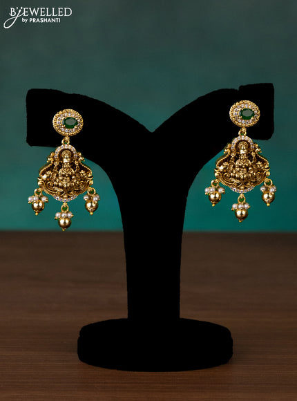Antique haaram lakshmi design with green kemp & cz stones and golden beads hanging